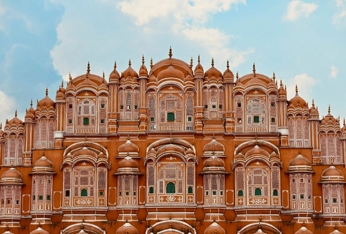 a very tall building with many windows and arches